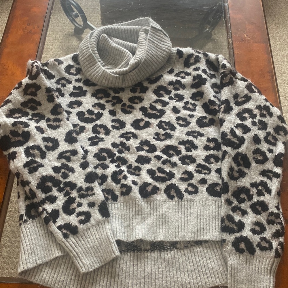Cheetah sweater. Gently used